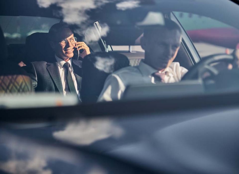 Chauffeur driving a businessman