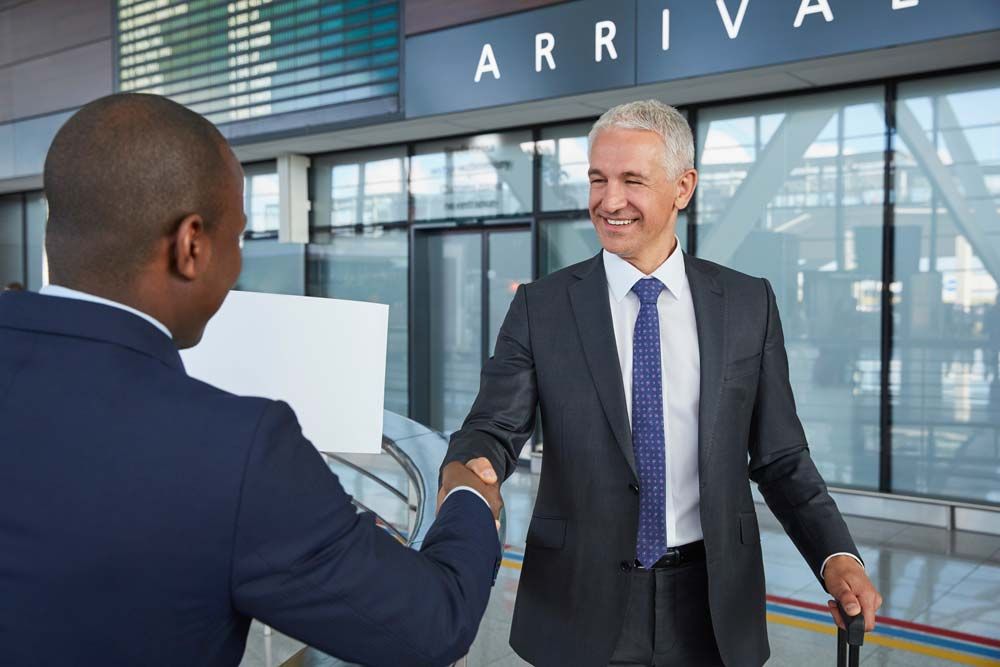 Chauffeur picking up passenger at the airport